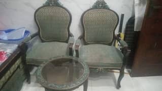 two chairs one teble