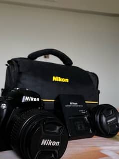 Nikon D5100 w/ 18-55mm and 50mm Lens