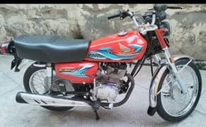 Honda 125 red colour