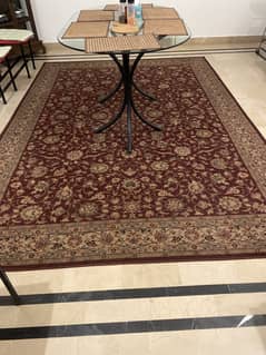 Maroon flowery carpet with border