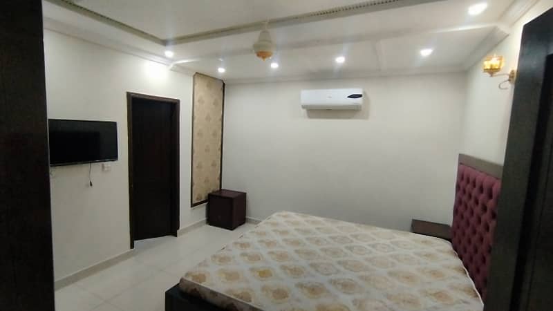 2 BED ROOMS FULLY LUXURY AND FULLY FURNISH IDEAL LOCATION EXCELLENT FLAT FOR RENT IN BAHRIA TOWN LAHORE 10