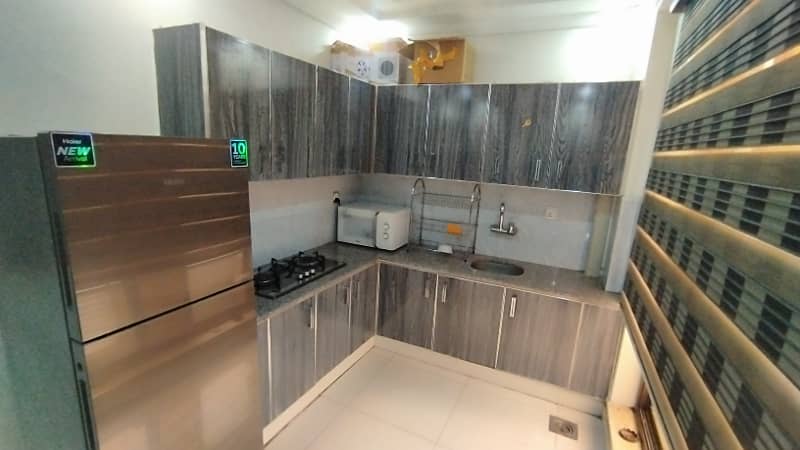 2 BED ROOMS FULLY LUXURY AND FULLY FURNISH IDEAL LOCATION EXCELLENT FLAT FOR RENT IN BAHRIA TOWN LAHORE 16