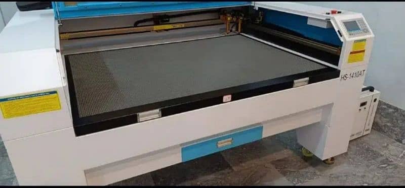 Laser cutting machine 12