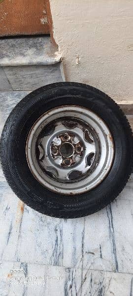 175 70 r13 stepney tire plus rim for sale in mint condition 0