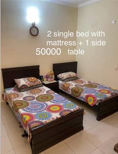 2 x single bed with mattress and sidetable