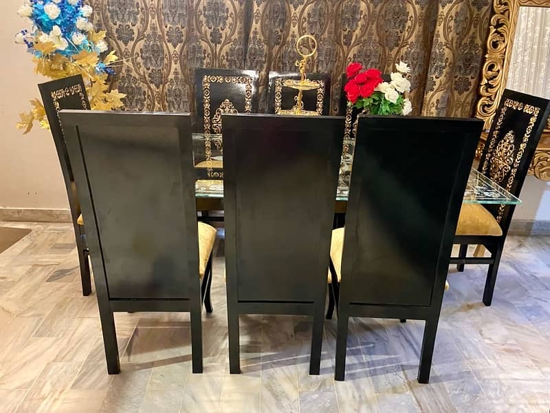 slightly used 8,chairs Designer dining set condition 10/10 5