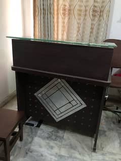 reception counter with revolving chair 0