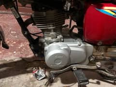 Honda 125 for sell lush condition red colour all documents complete