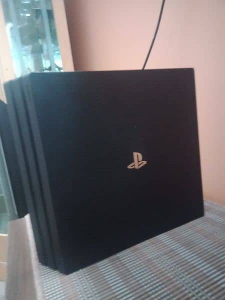 PS4 Pro 1TB and accessories. 11