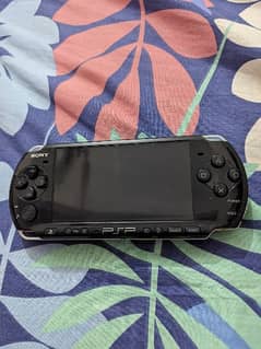 PsP 3000 series with 8 games