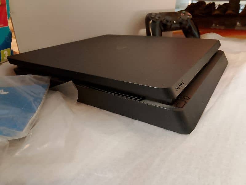 Ps4 slim 500gb sealed slightly used 2