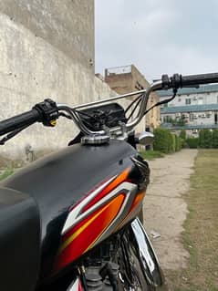 Honda 125 black golden number