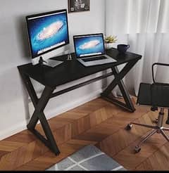 laptop and commuter tables metal legs and top material is wood