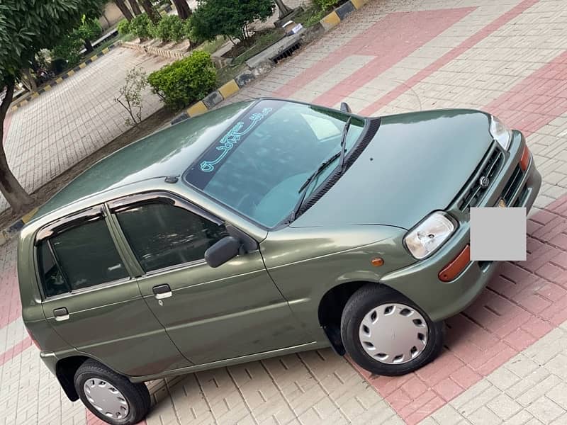 DAIHATSU CUORE CX ECO 2011 MODEL KARACHI REG EXCELLENT CAR 11