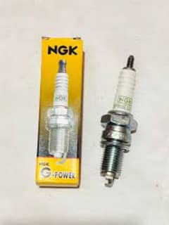 52 NGK or Honda. . . 125cc ke new spark plugs hai