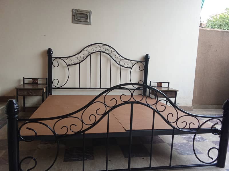 Wrought iron double bed with side table (used). Urgent sale 3