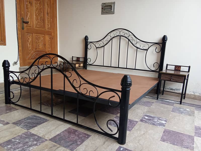 Wrought iron double bed with side table (used). Urgent sale 5