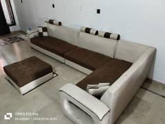 urgent selling L shaped 7 seater sofa with 4 cushions and centre table