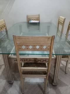 glass top dinning table with chairs