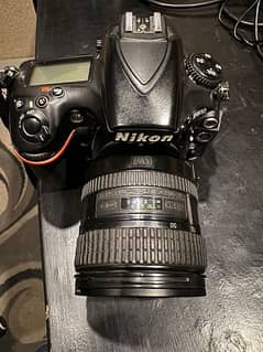 Nikon 810 camera with lens