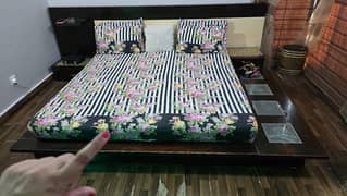 wooden bed and dressing