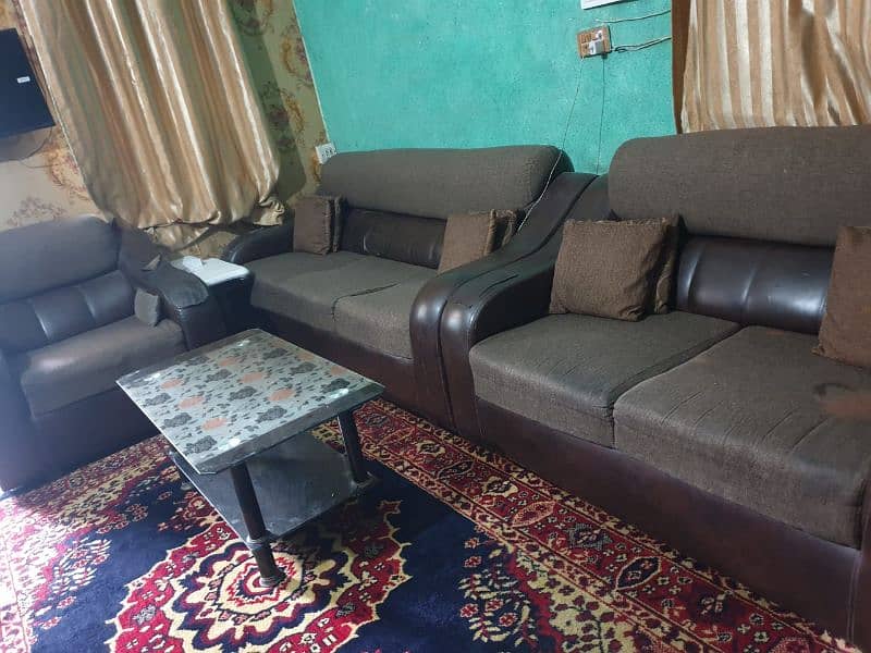 Brown leather sofa set with fabric seats 1