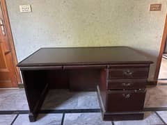 Study wooden table is up for sale