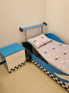 Car bed with side table