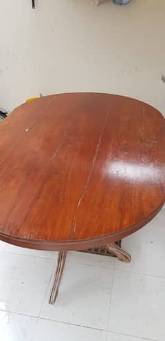 Wooden, good quality dining table with six shesham chairs.