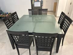 Wooden Dining table with 8 chairs