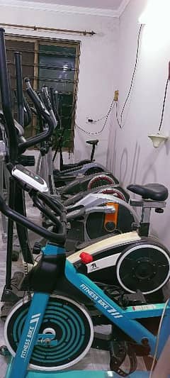 Exercise cycle elliptical spin bike recumbent back seat exercise