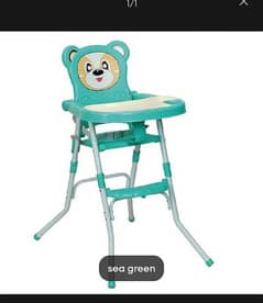 kids high chair slightly used in green color