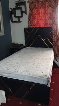 single bed with 2 side tables