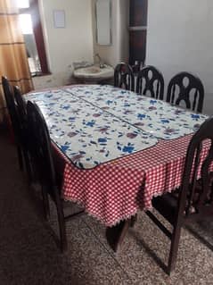 Dining table with 8 chairs.