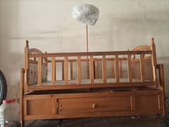 wooden baby cot with mosquito net