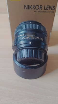 Nikon 50mm f/1.8 G lens with box 0