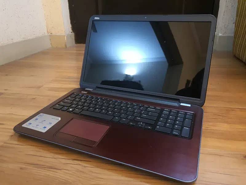 DELL INSPIRON 5735 IN MAROON AND IN GOOD SPECS AND DECENT CONDITION 2