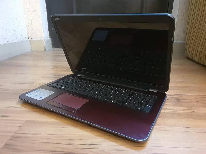 DELL INSPIRON 5735 IN MAROON AND IN GOOD SPECS AND DECENT CONDITION 4