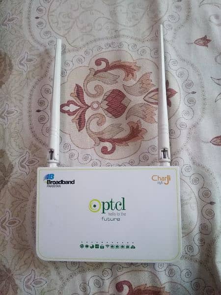 ptcl wifi router with cables. 0