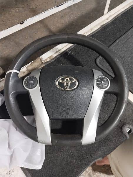 Toyota Prius + Aqua carbon fiber steering available 3