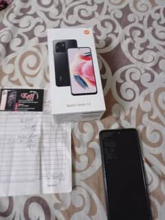 Redmi note 12 8 128 few months warranty available