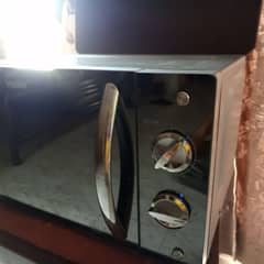 Haier microwave new condition urgent sale