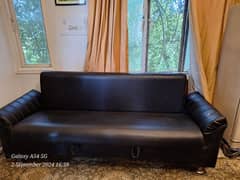 Comfortable black sofa cum bed