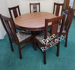 Wooden round dining table with 6 chair