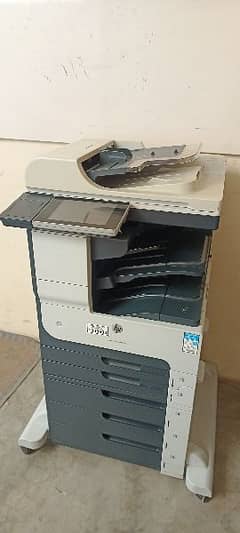 HP m725 printer for sale