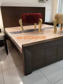 slightly used bed with side tables call 03124049200