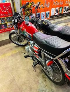 Honda 125 red color all Punjab number