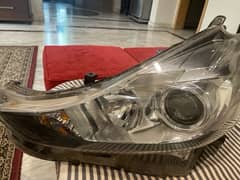 toyota Prius alpha head lights pair