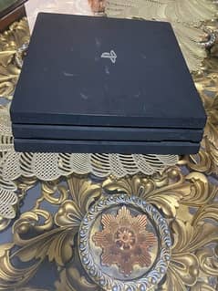 ps 4 pro 1 tb with 2 free controllers and gta v