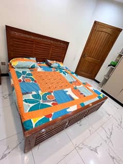 bed set with side tables and dressing table